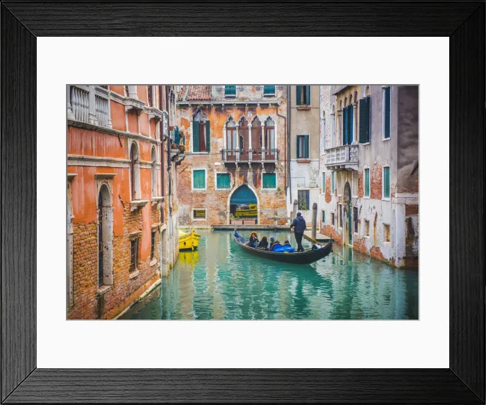 Framed Print : Venice Veneto, Italy. Tourists on gondola and waterfront palaces Framed Print : Venice Veneto, Italy. Tourists on gondola and waterfront palaces