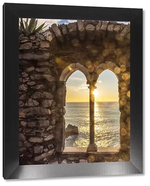 Europe, Italy, Liguria, Portovenere. Sunset seen through the old ruins