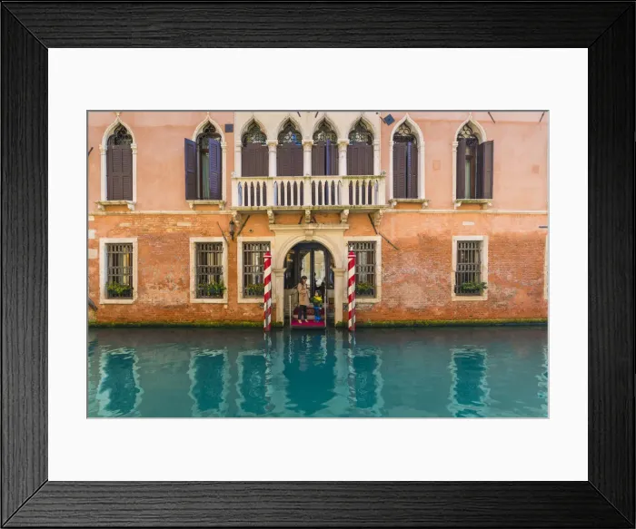 Framed Print : Venice, Veneto, Italy. Tourists on the pier of a Waterfront palace hotel