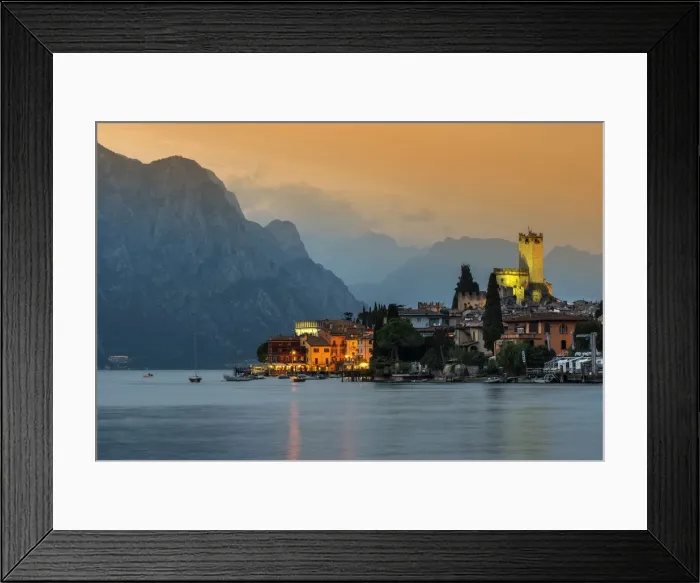 Framed Print : Sunset view of Malcesine, Lake Garda, Veneto, Italy Framed Print : Sunset view of Malcesine, Lake Garda, Veneto, Italy