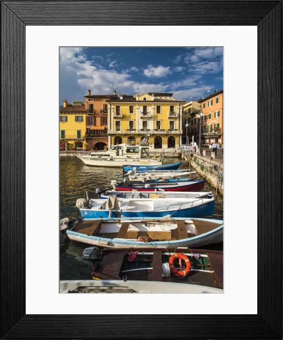 Framed Print : Boats moored in the harbor of Malcesine, Lake Garda, Veneto, Italy Framed Print : Boats moored in the harbor of Malcesine, Lake Garda, Veneto, Italy
