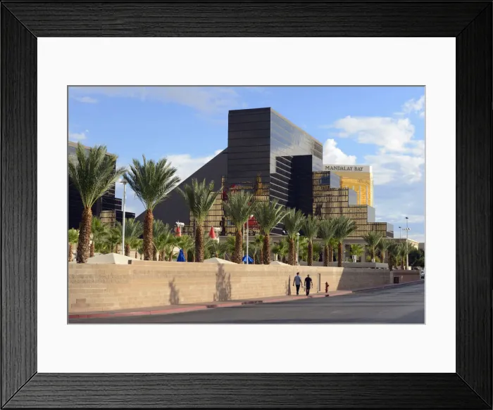 Framed Print : USA, Nevada, Las Vegas, Mandalay Bay hotel and casino from the back with people walking Framed Print : USA, Nevada, Las Vegas, Mandalay Bay hotel and casino from the back with people walking
