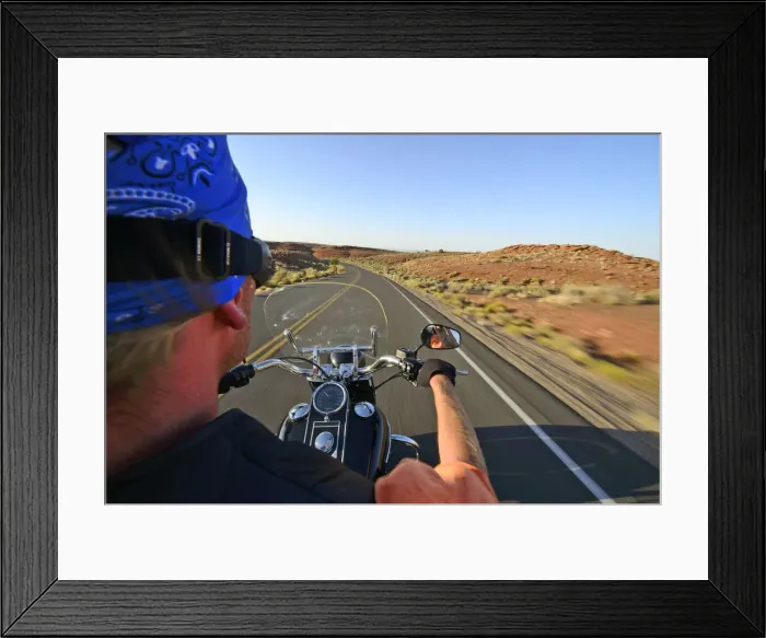 Framed Print : Man riding his Harley near Flagstaff, Arizona, USA Framed Print : Man riding his Harley near Flagstaff, Arizona, USA