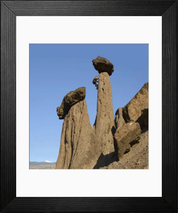 Framed Print : Man climbing up on Hoodoo, Balanced Rocks, Jefferson County, near Lake Billy Chinook Framed Print : Man climbing up on Hoodoo, Balanced Rocks, Jefferson County, near Lake Billy Chinook