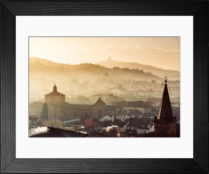 Framed Print : Sunset in Bologna, rooftops and hills in background with Santuario di San Luca