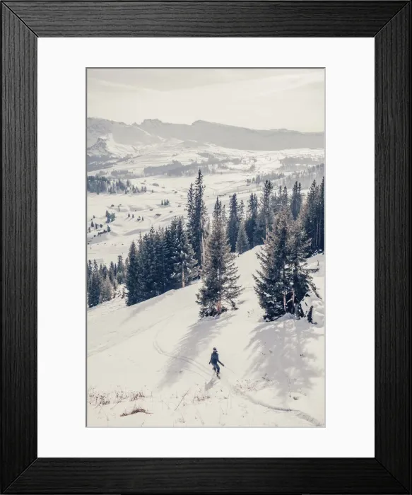 Framed Print : A woman skiing downhill at sunset on a winter afternoon in Alpe di Siusi valley Framed Print : A woman skiing downhill at sunset on a winter afternoon in Alpe di Siusi valley