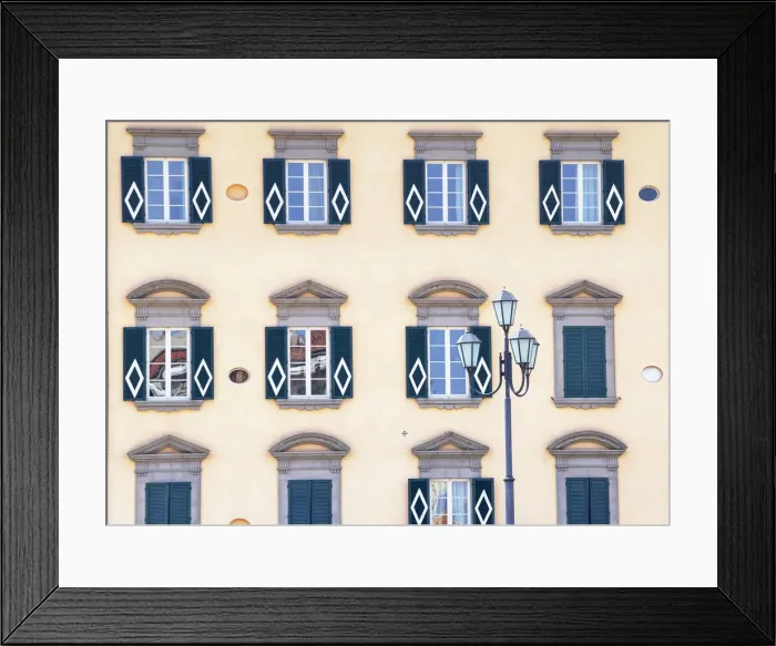 Framed Print : Traditional house decorated with Pisa symbol on the bank of Arno River, Pisa, Tuscany Framed Print : Traditional house decorated with Pisa symbol on the bank of Arno River, Pisa, Tuscany