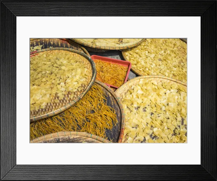 Framed Print : Cau Lau noodles drying in the sun on the street in Hoi An, Quang Nam Province, Vietnam
