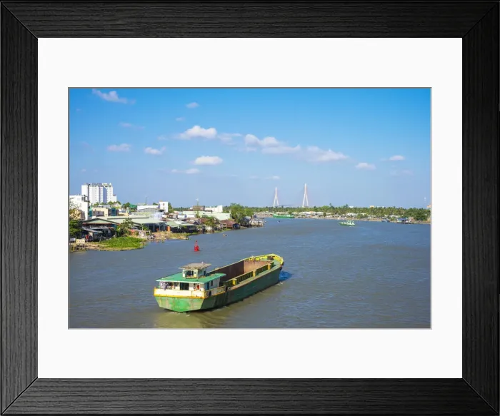 Framed Print : The city of Can Tho on the Can Tho river, a branch of the Mekong River, and the Can Framed Print : The city of Can Tho on the Can Tho river, a branch of the Mekong River, and the Can