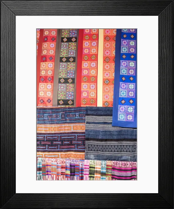 Framed Print : Colourful fabrics hanging in a market, Sapa; Sa Pa District; Lao Cai Province; Vietnam Framed Print : Colourful fabrics hanging in a market, Sapa; Sa Pa District; Lao Cai Province; Vietnam