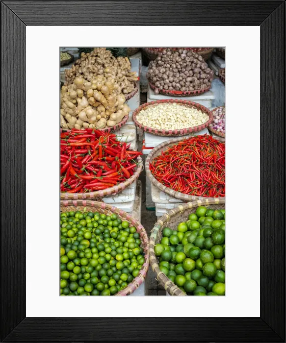 Framed Print : Chili peppers, limes, ginger and garlic for sale at Đồng Xuan