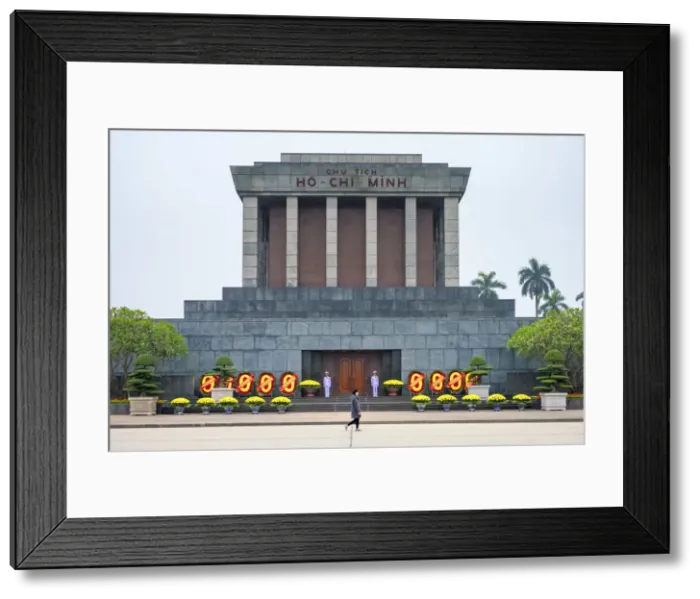 Framed Print : A woman walks past Ho Chi Minh Mausoleum on Ba Dinh Square, Hanoi, Vietnam Framed Print : A woman walks past Ho Chi Minh Mausoleum on Ba Dinh Square, Hanoi, Vietnam