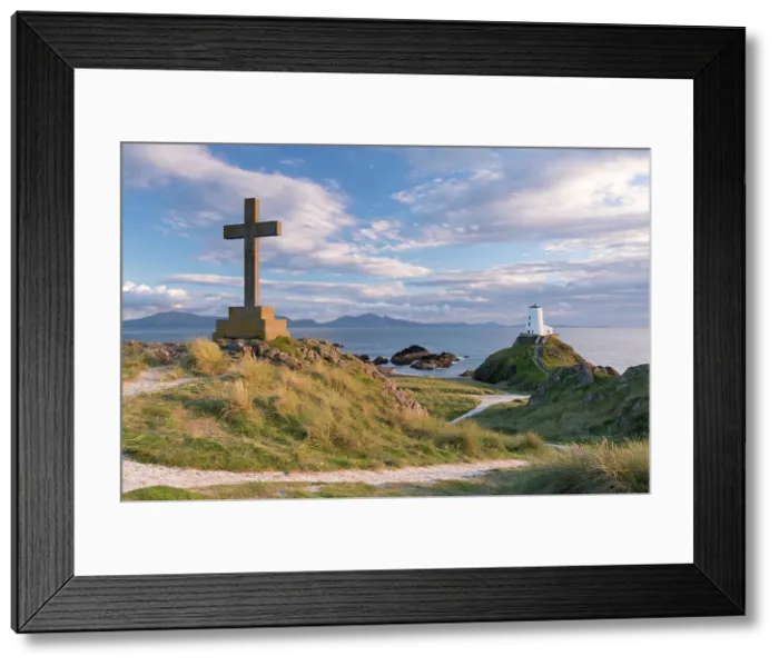 Framed Print : Cross and lighthouse on Llanddwyn Island, Anglesey, Wales. Autumn (September) Framed Print : Cross and lighthouse on Llanddwyn Island, Anglesey, Wales. Autumn (September)