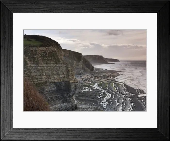 Framed Print : Dramatic cliffs along the Glamorgan Heritage Coast, South Wales, UK. Winter Framed Print : Dramatic cliffs along the Glamorgan Heritage Coast, South Wales, UK. Winter