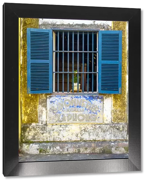 Window with blue shutters in Hoi An Ancient Town, Hoi An, Quang Nam Province, Vietnam
