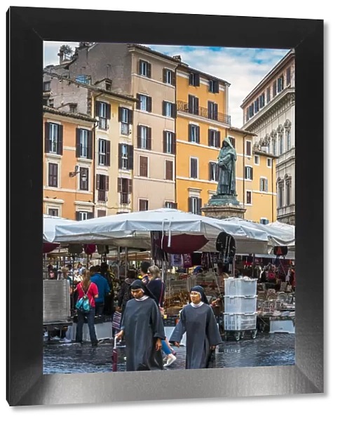 Nuns walking in Campo de Fiori square, Rome, Lazio, Italy