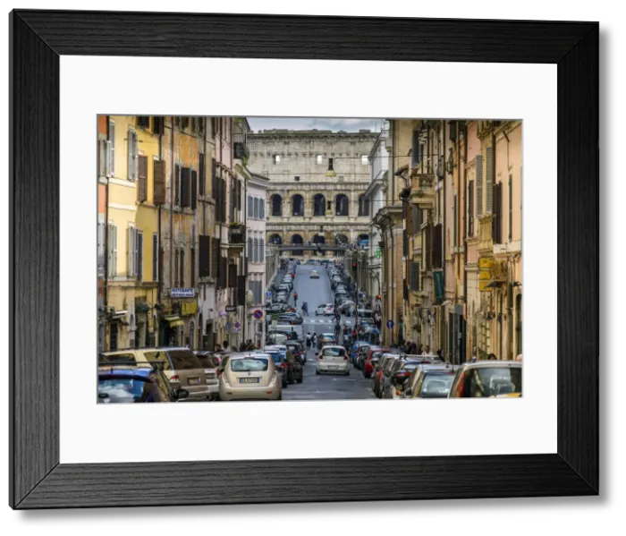 Framed Print : Street in Monti district with Colosseum in the background, Rome, Lazio, Italy Framed Print : Street in Monti district with Colosseum in the background, Rome, Lazio, Italy