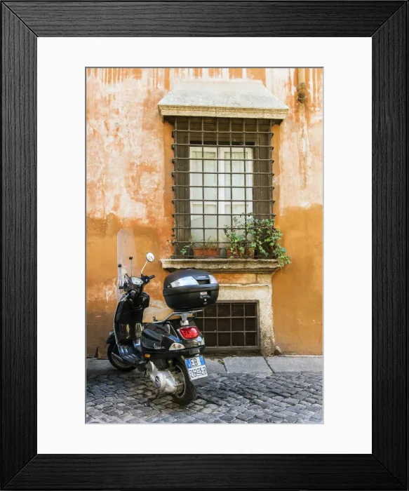 Framed Print : Italian Vespa scooter parked in a cobblestone street of Rome, Lazio, Italy Framed Print : Italian Vespa scooter parked in a cobblestone street of Rome, Lazio, Italy