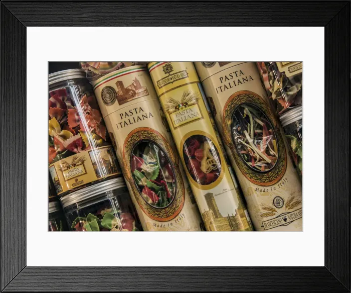 Framed Print : Colorful Italian pasta tin packaging containers on sale in a drugstore of Trastevere Framed Print : Colorful Italian pasta tin packaging containers on sale in a drugstore of Trastevere