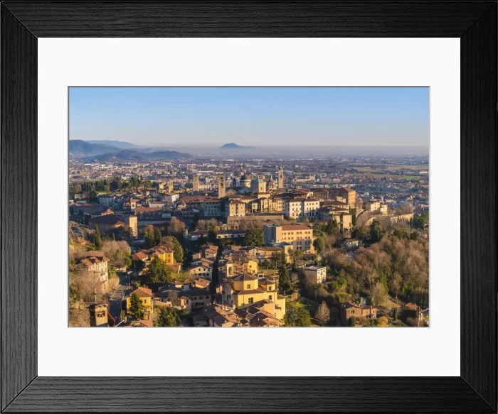 Framed Print : Bergamo, Lombardy, Italy. High angle view over Upper Town (Citta Alta) at sunset Framed Print : Bergamo, Lombardy, Italy. High angle view over Upper Town (Citta Alta) at sunset