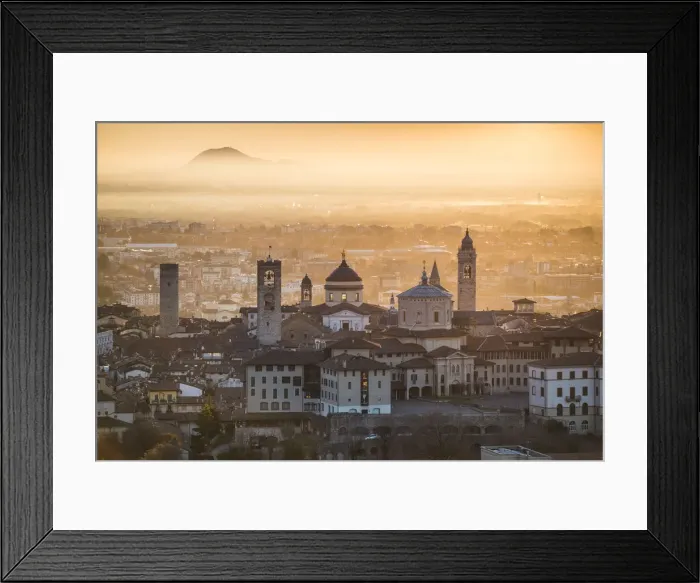 Framed Print : Bergamo, Lombardy, Italy. High angle view over Upper Town (Citta Alta) at sunrise