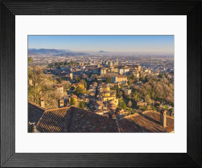 Framed Print : Bergamo, Lombardy, Italy. High angle view over Upper Town (Citta Alta) at sunset Framed Print : Bergamo, Lombardy, Italy. High angle view over Upper Town (Citta Alta) at sunset