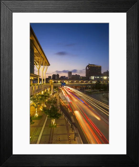 Framed Print : Traffic passing Asahibashi monorail station in downtown Naha, Okinawa, Japan Framed Print : Traffic passing Asahibashi monorail station in downtown Naha, Okinawa, Japan