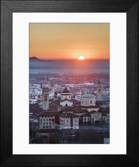 Framed Print : Bergamo, Lombardy, Italy. High angle view over Upper Town (Citta Alta) at sunrise Framed Print : Bergamo, Lombardy, Italy. High angle view over Upper Town (Citta Alta) at sunrise