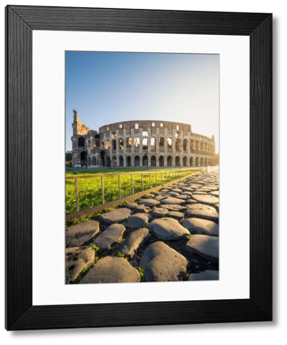 Framed Print : Rome, Lazio, Italy. Colosseum and Via Sacra (Sacred Road) at sunrise Framed Print : Rome, Lazio, Italy. Colosseum and Via Sacra (Sacred Road) at sunrise