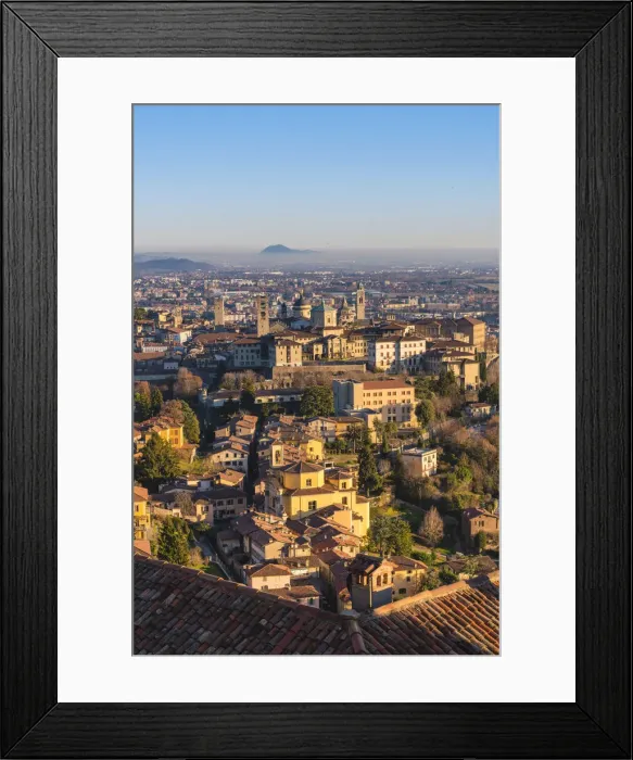 Framed Print : Bergamo, Lombardy, Italy. High angle view over Upper Town (Citta Alta) at sunset Framed Print : Bergamo, Lombardy, Italy. High angle view over Upper Town (Citta Alta) at sunset