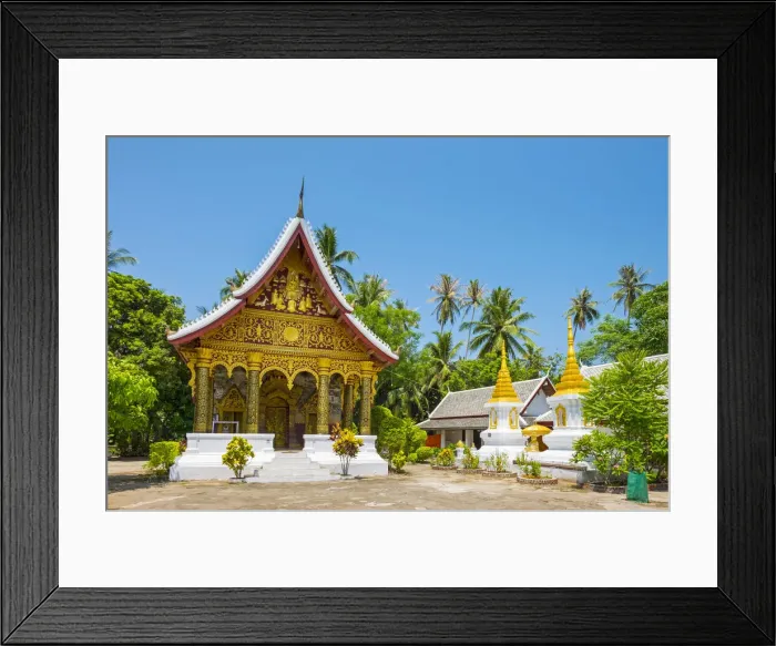 Framed Print : Wat Paphaimisaiyaram temple and stupas in front of monks quarters, Luang Prabang Framed Print : Wat Paphaimisaiyaram temple and stupas in front of monks quarters, Luang Prabang