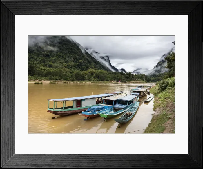 Framed Print : Traditional longboats moored up on Nam Ou river, Nong Khiaw, Luang Prabang Province