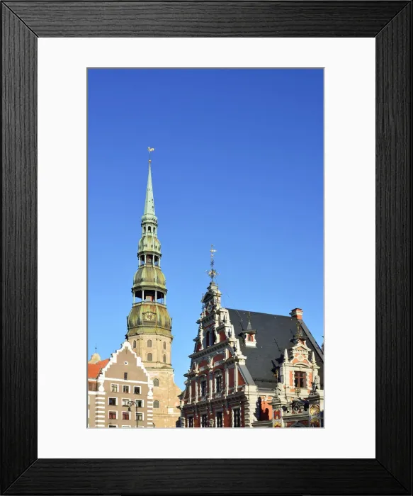 Framed Print : St. Peters Church built in 1209 and the museum of the Brotherhood of Blackheads house