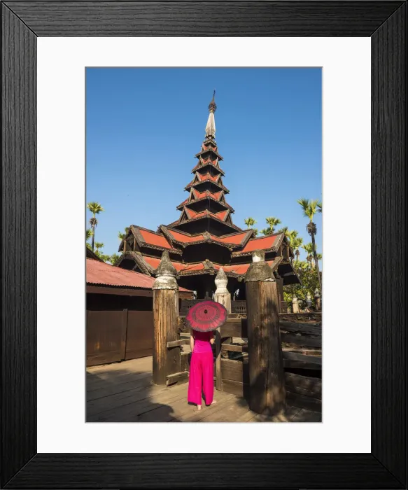 Framed Print : Inwa, Mandalay region, Myanmar (Burma). A woman with red dress and umbrella in Framed Print : Inwa, Mandalay region, Myanmar (Burma). A woman with red dress and umbrella in