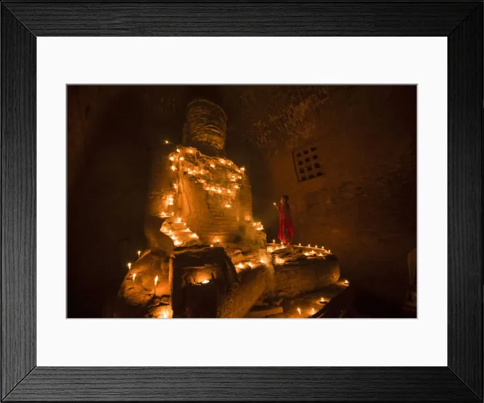 Framed Print : Bagan, Mandalay region, Myanmar (Burma). Young monk praying at a giant brick-make Framed Print : Bagan, Mandalay region, Myanmar (Burma). Young monk praying at a giant brick-make