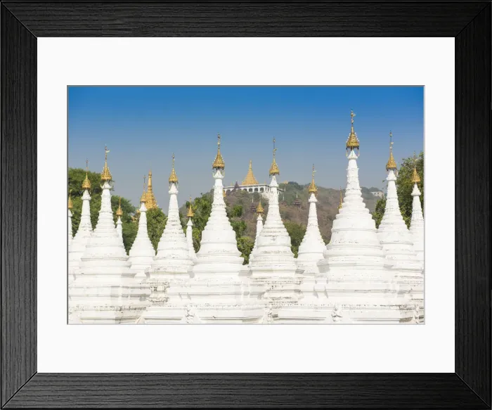 Framed Print : Mandalay, Myanmar. Kuthodaw pagodas spires with Mandalay hill on the background Framed Print : Mandalay, Myanmar. Kuthodaw pagodas spires with Mandalay hill on the background