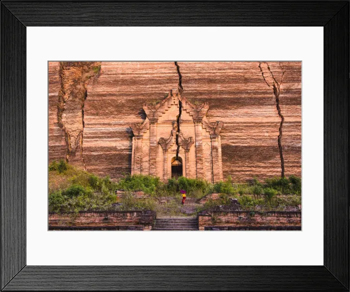 Framed Print : Mingun, Sagaing region, Myanmar (Burma). Woman with red umbrella climbs the stairs
