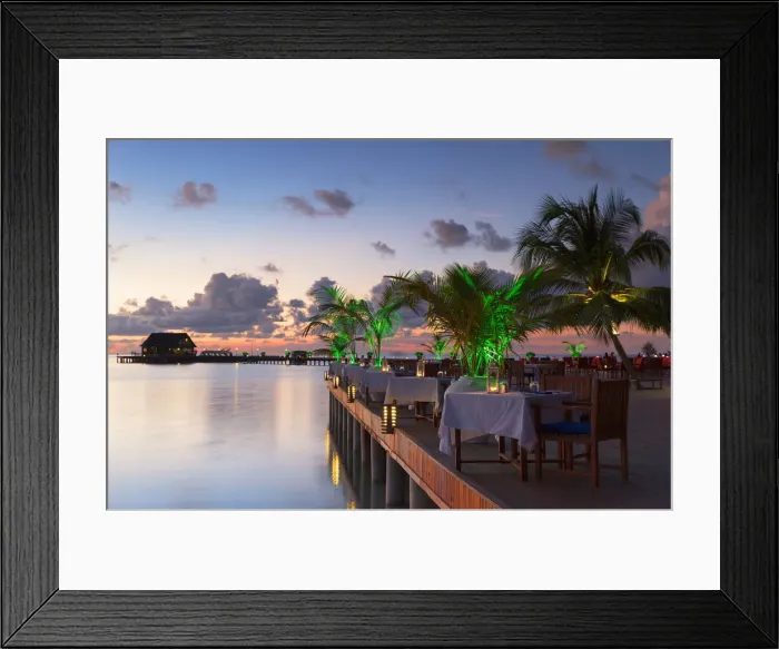 Framed Print : Restaurant at Olhuveli Beach and Spa Resort at sunset, South Male Atoll, Kaafu Atoll