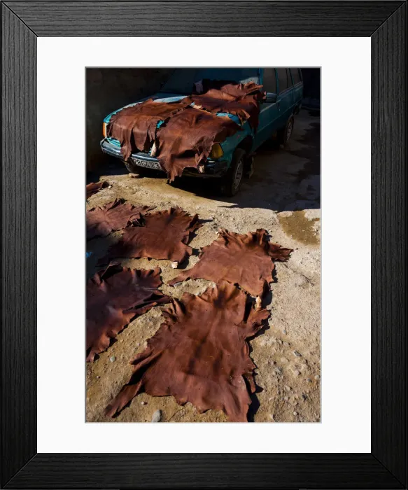 Framed Print : Marrakech, Morocco. Drying leathers on the street