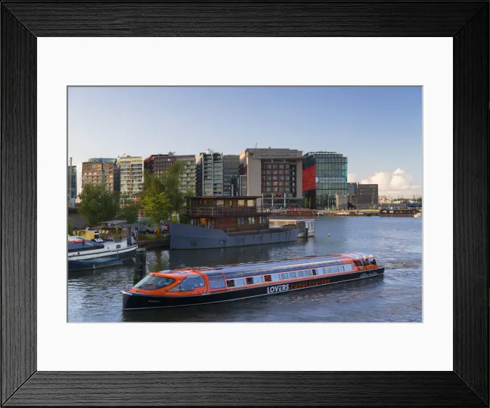 Framed Print : Tourist cruise boat in Oosterdok (East Dock), Amsterdam, Netherlands Framed Print : Tourist cruise boat in Oosterdok (East Dock), Amsterdam, Netherlands
