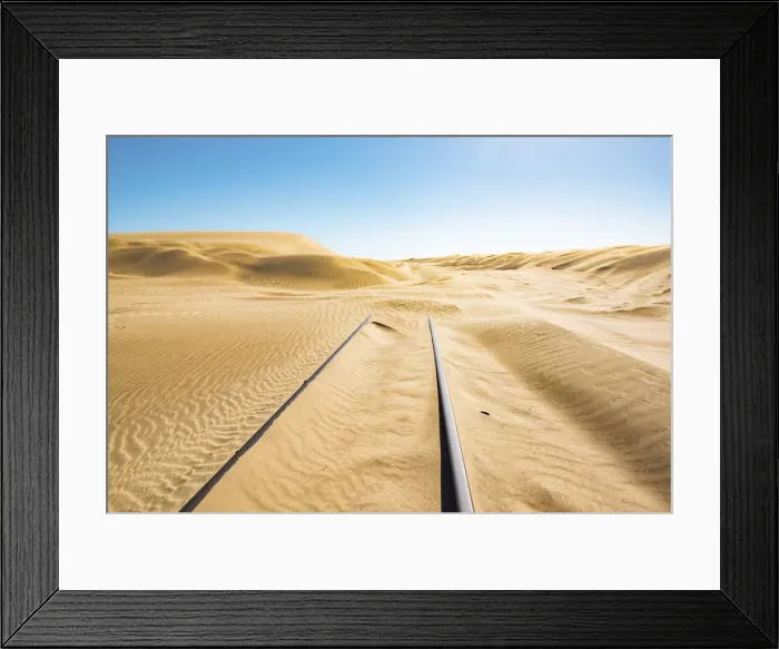 Framed Print : Railway tracks leading into a sand dune, Luderitz, Namibia, Africa Framed Print : Railway tracks leading into a sand dune, Luderitz, Namibia, Africa