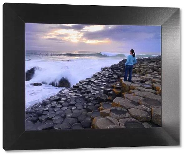 Northern Ireland, County antrim, Giants causeway, woman looking at sea