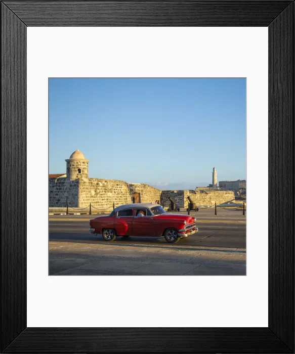 Framed Print : Car driving past the Castillo de San Salvador de la Punta, Havana, Cuba Framed Print : Car driving past the Castillo de San Salvador de la Punta, Havana, Cuba