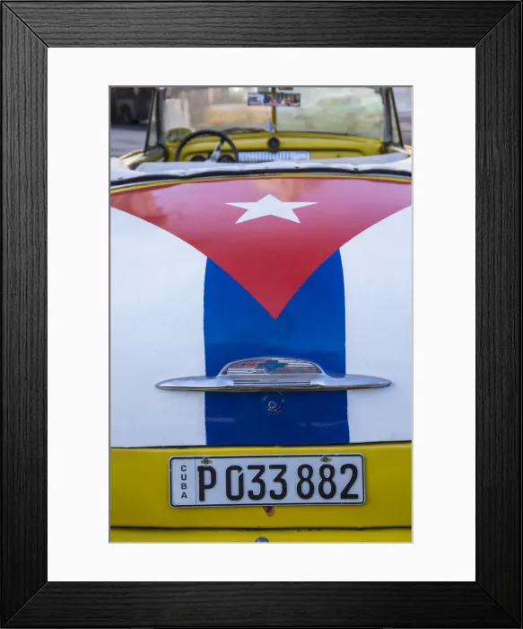Framed Print : Classic American car with the Cuban flag painted in its boot, Parque Central Framed Print : Classic American car with the Cuban flag painted in its boot, Parque Central