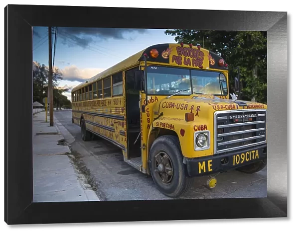 Cuba, Varadero, American yellow school bus, given to aid USA - Cuban relations