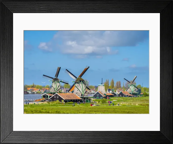 Framed Print : Netherlands, North Holland, Zaandam. Historic windmills and houses in the village Framed Print : Netherlands, North Holland, Zaandam. Historic windmills and houses in the village
