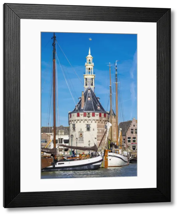 Framed Print : Netherlands, North Holland, Hoorn. The Hoofdtoren tower on the Binnenhaven harbor