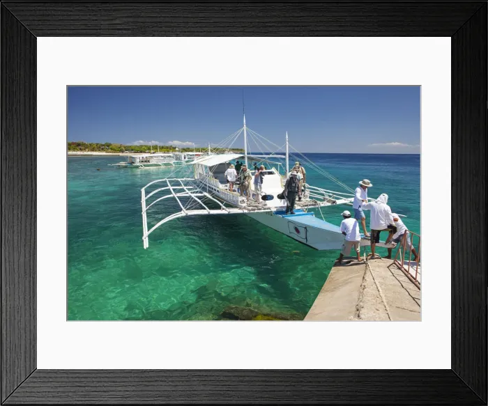 Framed Print : Asia, South East Asia, Philippines, Visayas, Cebu, tourists disembarking from an outrigger Framed Print : Asia, South East Asia, Philippines, Visayas, Cebu, tourists disembarking from an outrigger