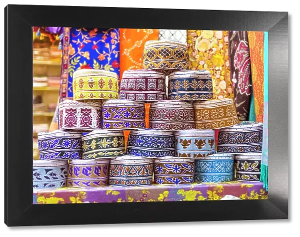 Oman, Muscat. Souvenirs for sale at a shop in the old souk of Mutrah
