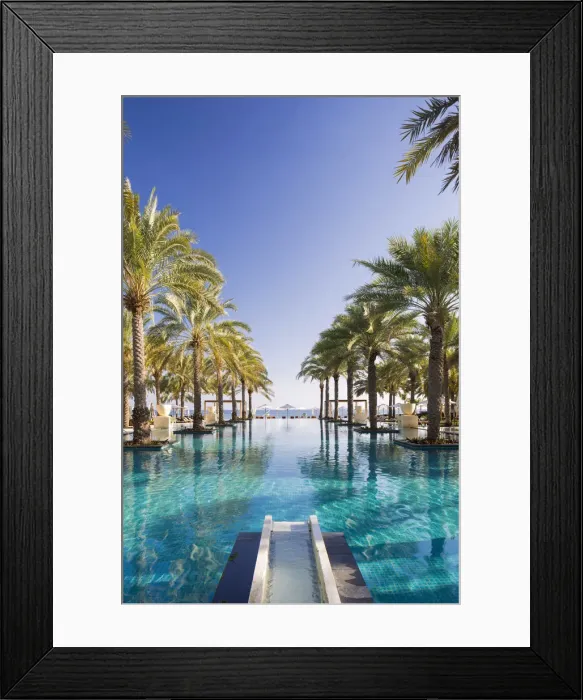 Framed Print : Oman. Muscat Governorate, Muscat. The 50 metre infinity pool at the Ritz Carlton Al Framed Print : Oman. Muscat Governorate, Muscat. The 50 metre infinity pool at the Ritz Carlton Al